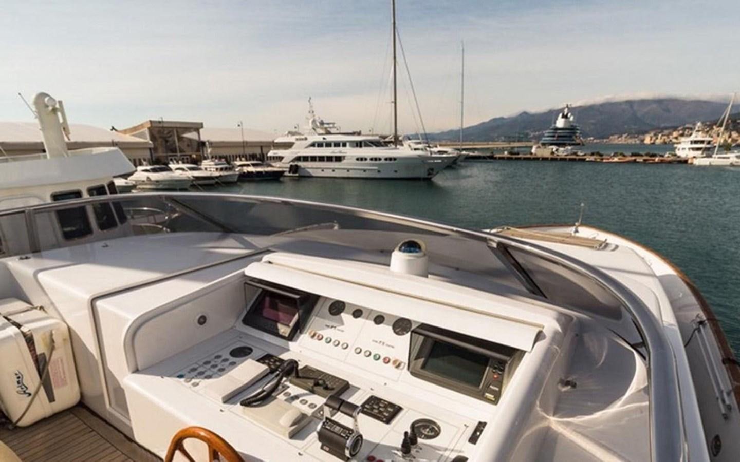 a boat docked at a pier aboard ZOO Yacht for Sale