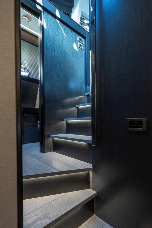 a door with a glass window aboard BOMBADIL III Yacht for Sale
