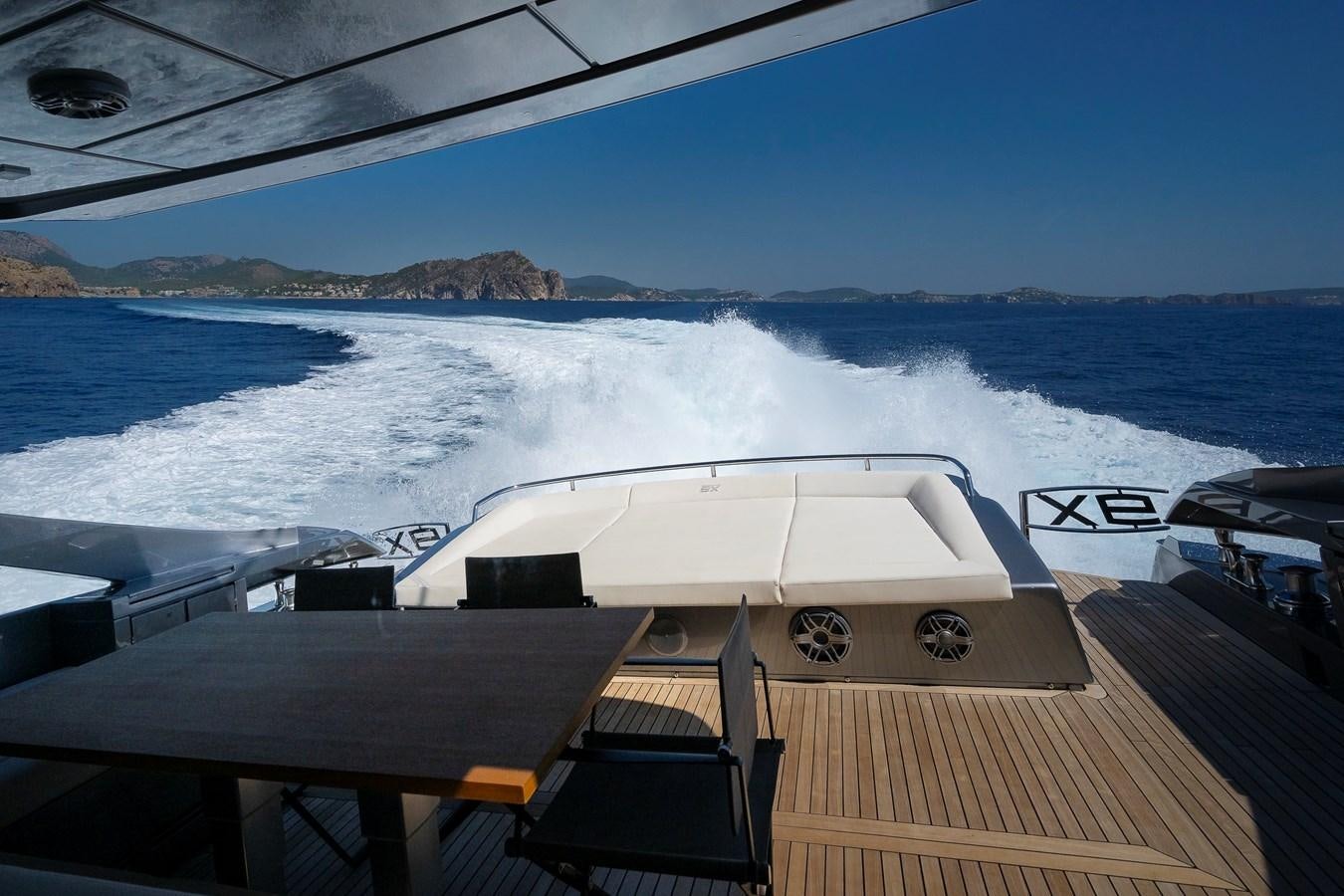 a boat on a deck aboard BOMBADIL III Yacht for Sale