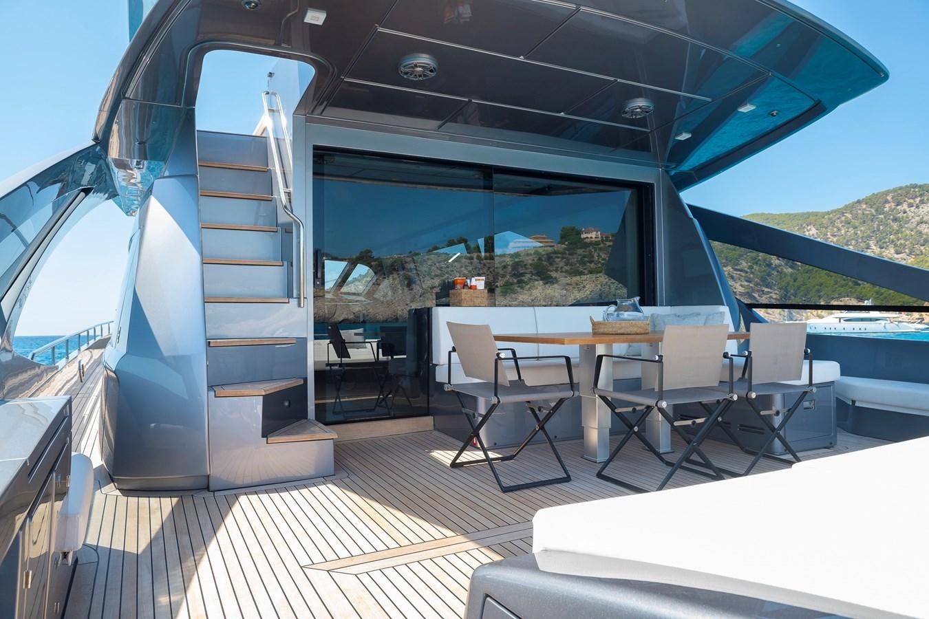 a boat on a deck aboard BOMBADIL III Yacht for Sale
