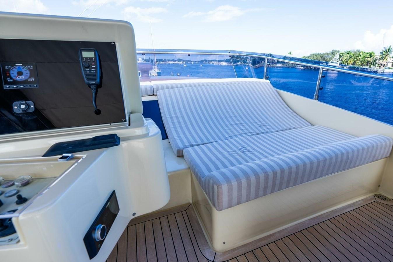 a deck with a bed and a television on it aboard ALTURA 840 Yacht for Sale