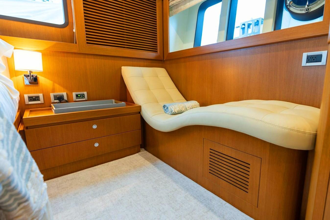 a room with a bed and a window aboard ALTURA 840 Yacht for Sale