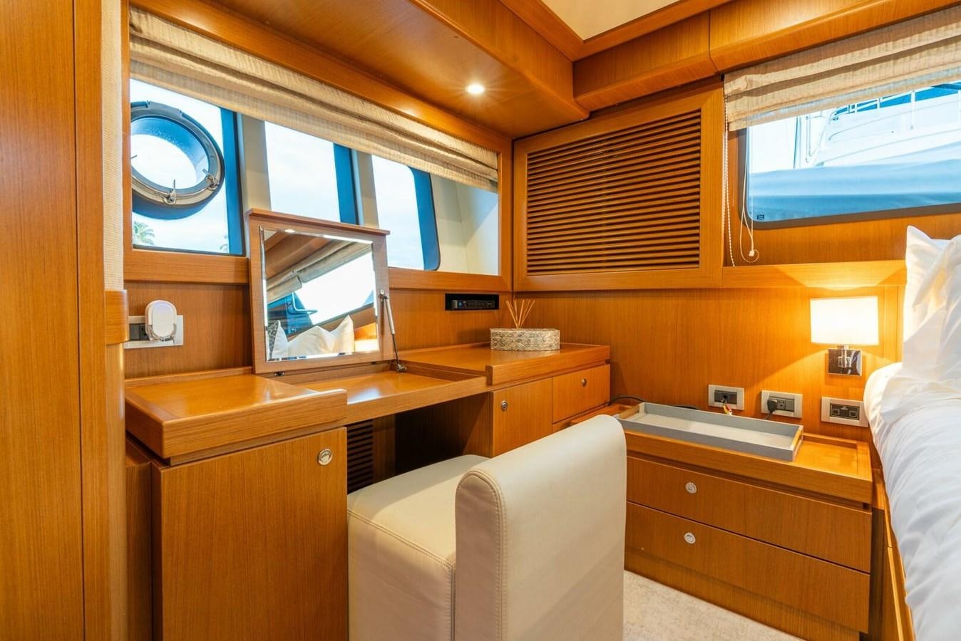 a room with a bed and a desk aboard ALTURA 840 Yacht for Sale