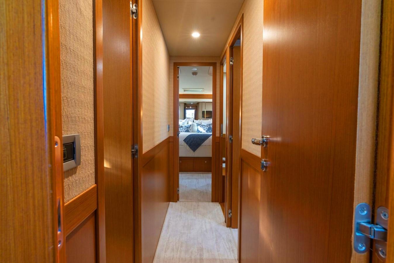 a room with a wood door and a mirror aboard ALTURA 840 Yacht for Sale