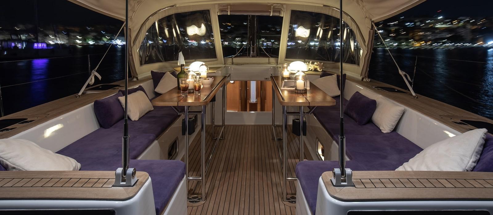 a boat with a table and chairs aboard TURCONERI Yacht for Sale