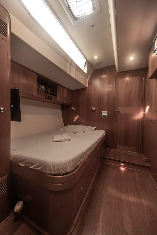 a bed in a room aboard TURCONERI Yacht for Sale