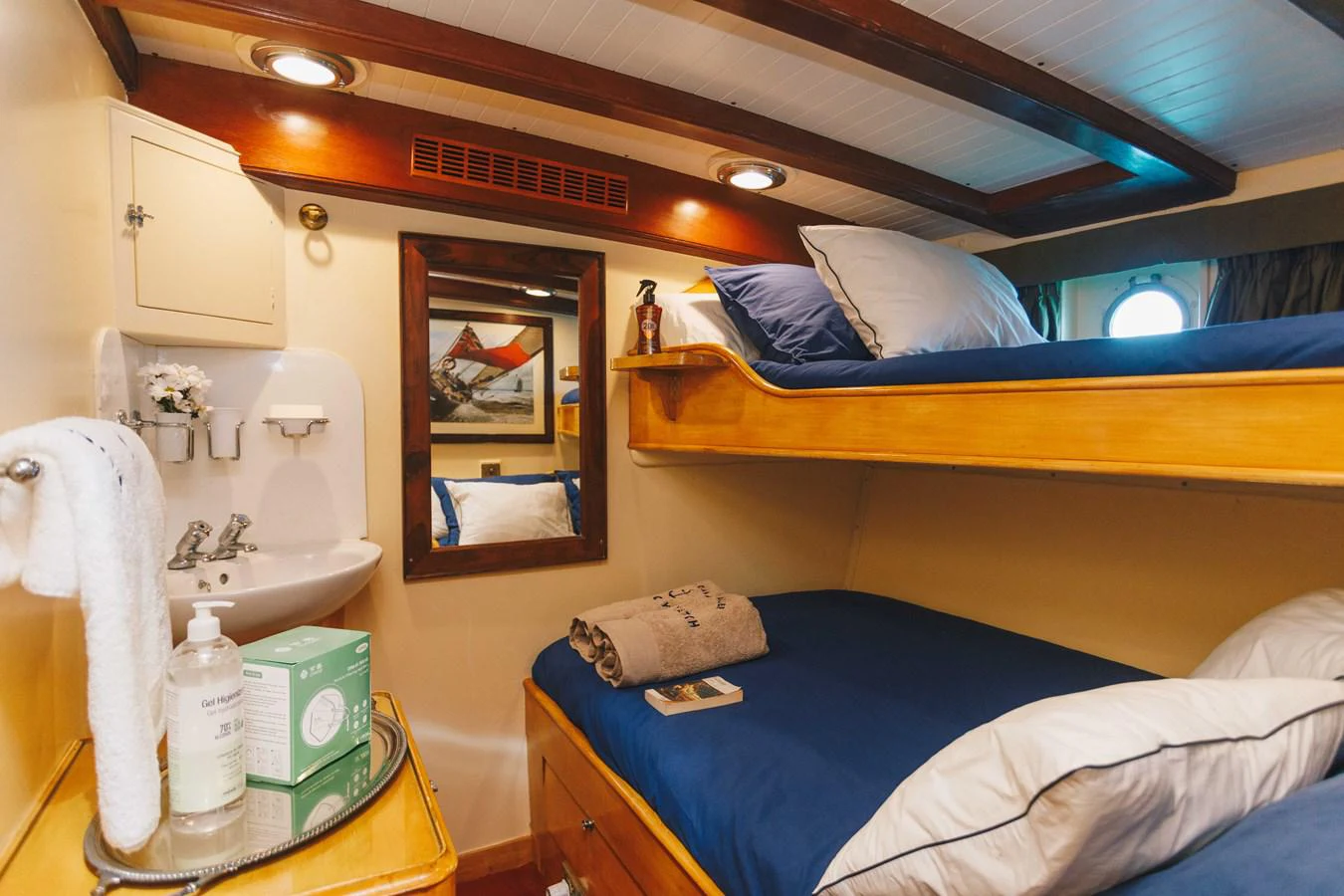 a small bedroom with a bed aboard SILVER CAVALIER Yacht for Sale