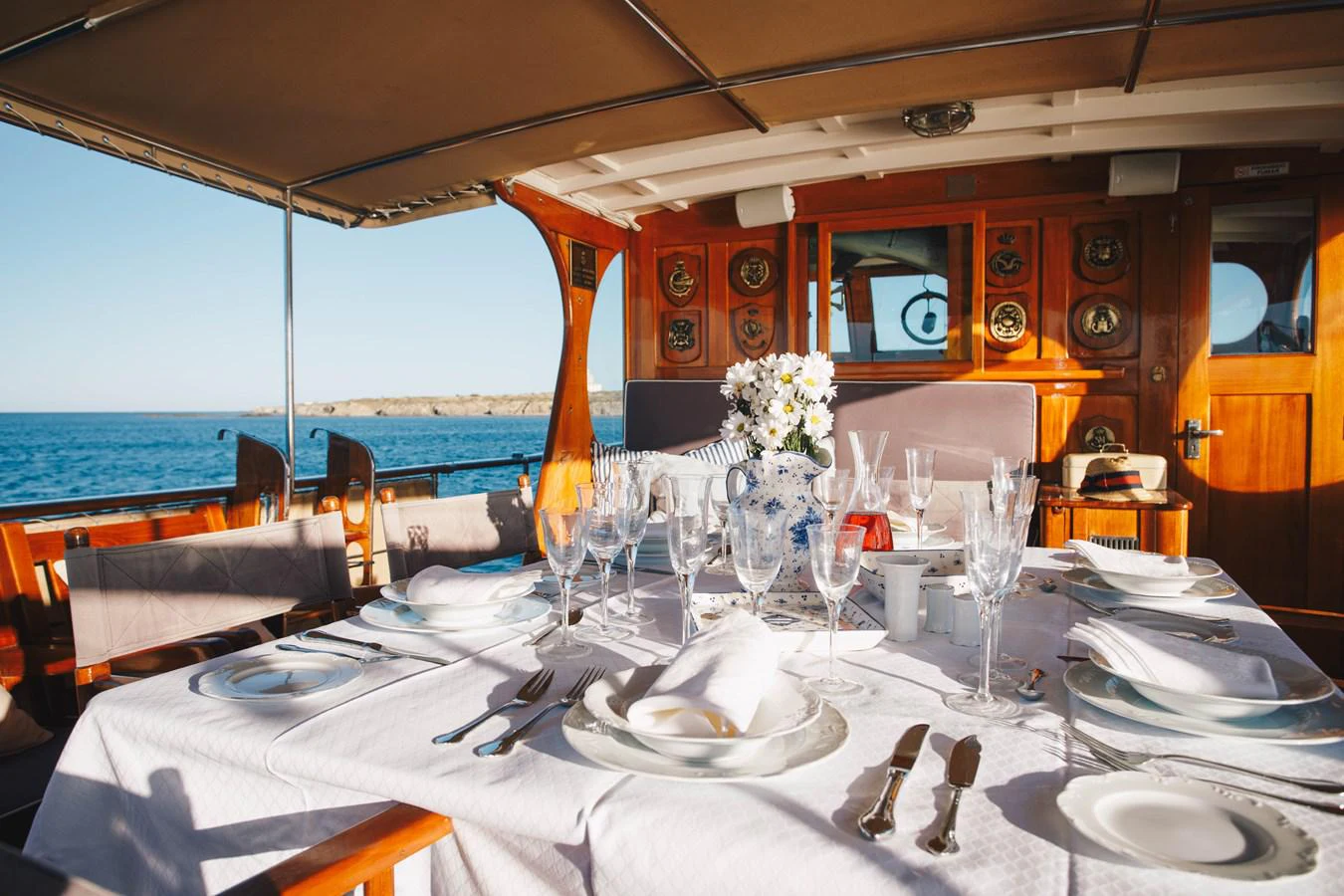 a table set for a dinner aboard SILVER CAVALIER Yacht for Sale
