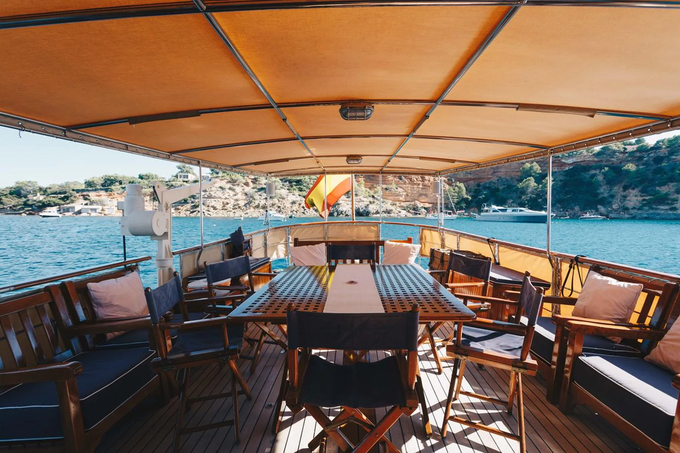 a deck with chairs and tables on it aboard SILVER CAVALIER Yacht for Sale