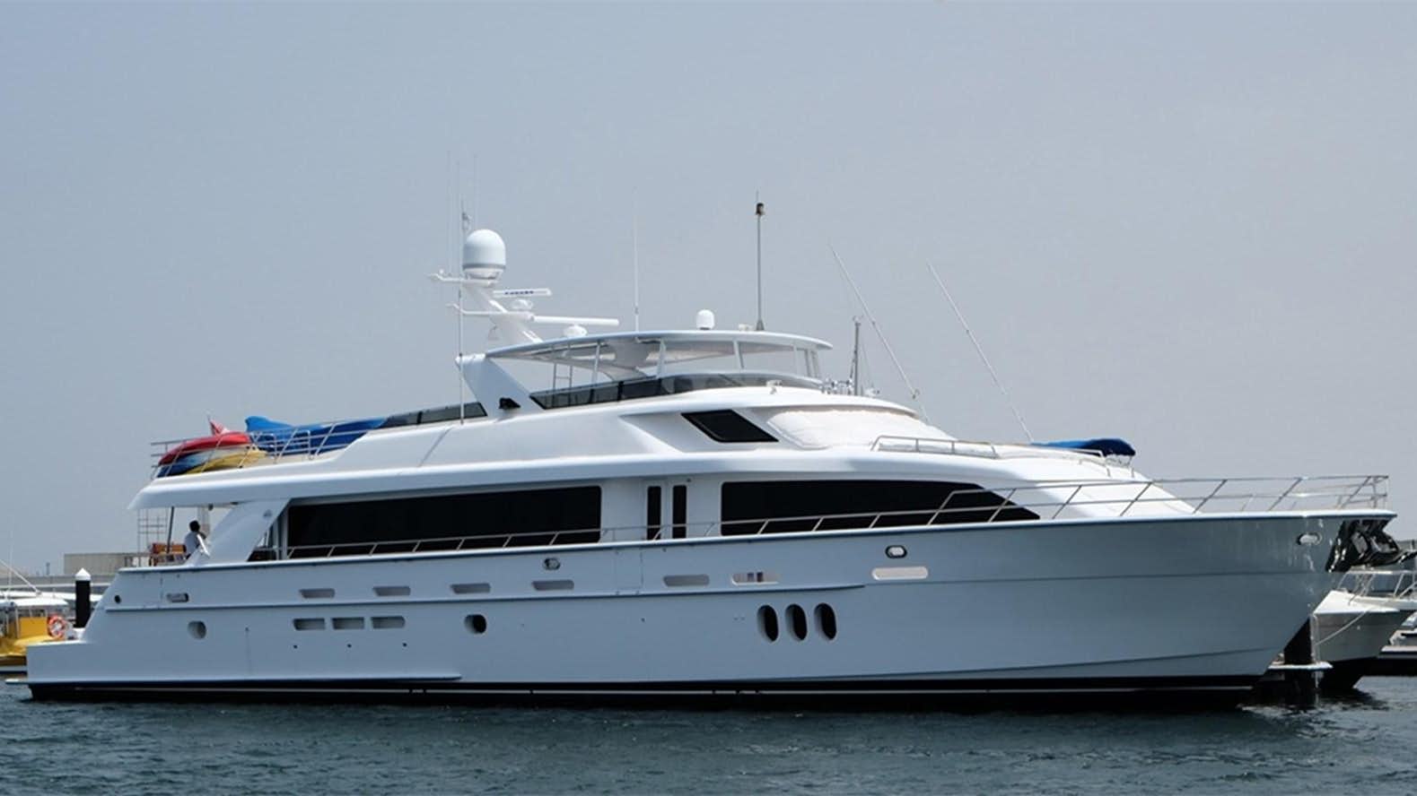 a white yacht in the water aboard HATTERAS 105 Yacht for Sale