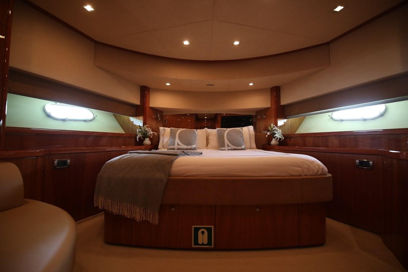 a bed in a room aboard 2008 SUNSEEKER 90 Yacht for Sale