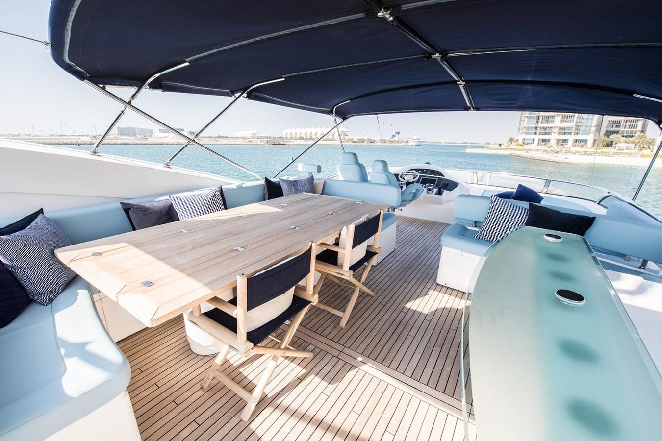 a deck with a pool and a deck with a view of the water aboard 2008 SUNSEEKER 90 Yacht for Sale