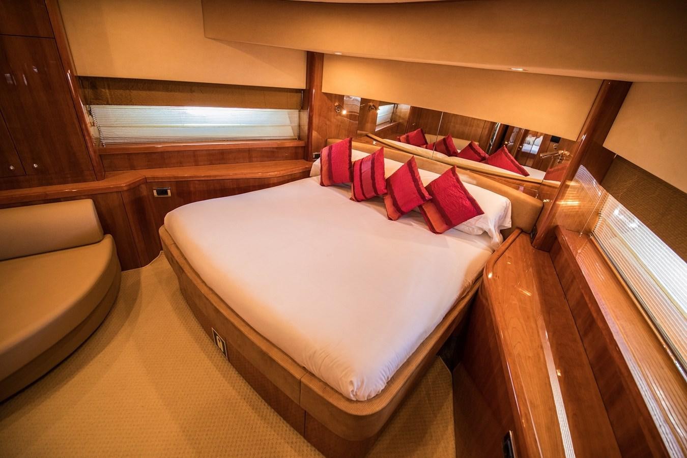 a bed in a room aboard 2008 SUNSEEKER 90 Yacht for Sale