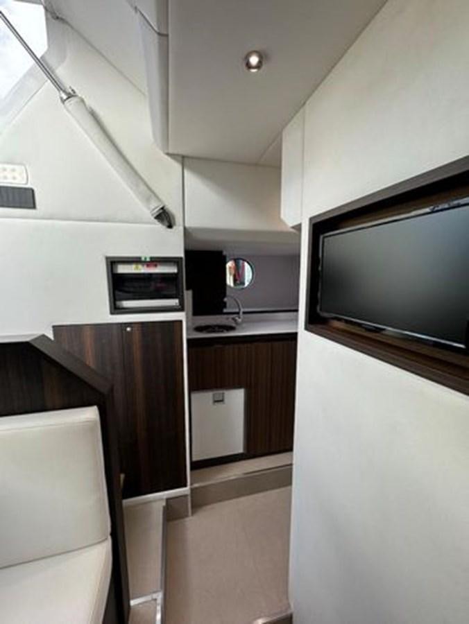 a tv on a wall aboard AICON 66 VIVERE Yacht for Sale