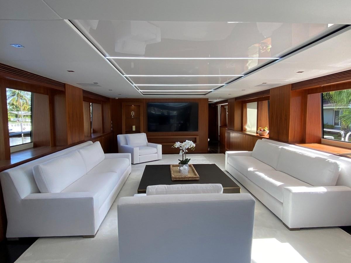 a living room with white couches aboard SEAHORSE Yacht for Sale