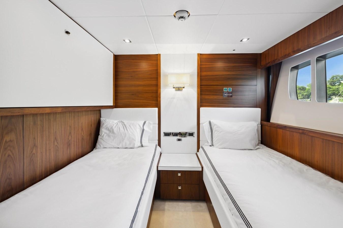 a room with two beds aboard SEAHORSE Yacht for Sale