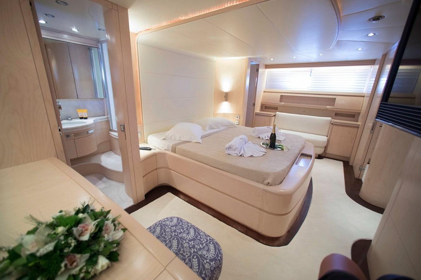a hotel room with a bed aboard PRINCESS L Yacht for Sale