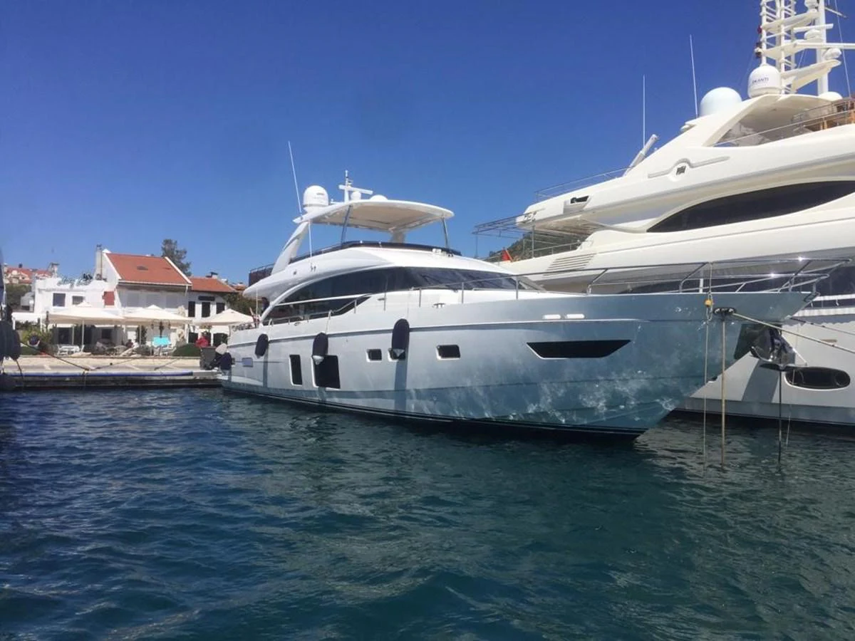 a couple of large white yachts aboard ANIKO Yacht for Sale
