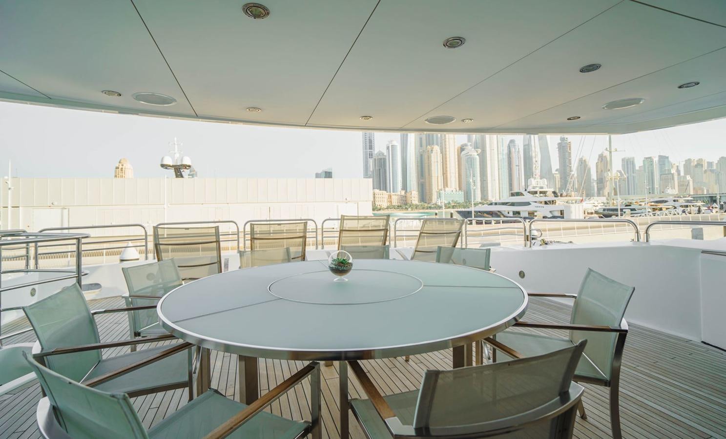 a large room with tables and chairs aboard 2010 SUNSEEKER 40M Yacht for Sale