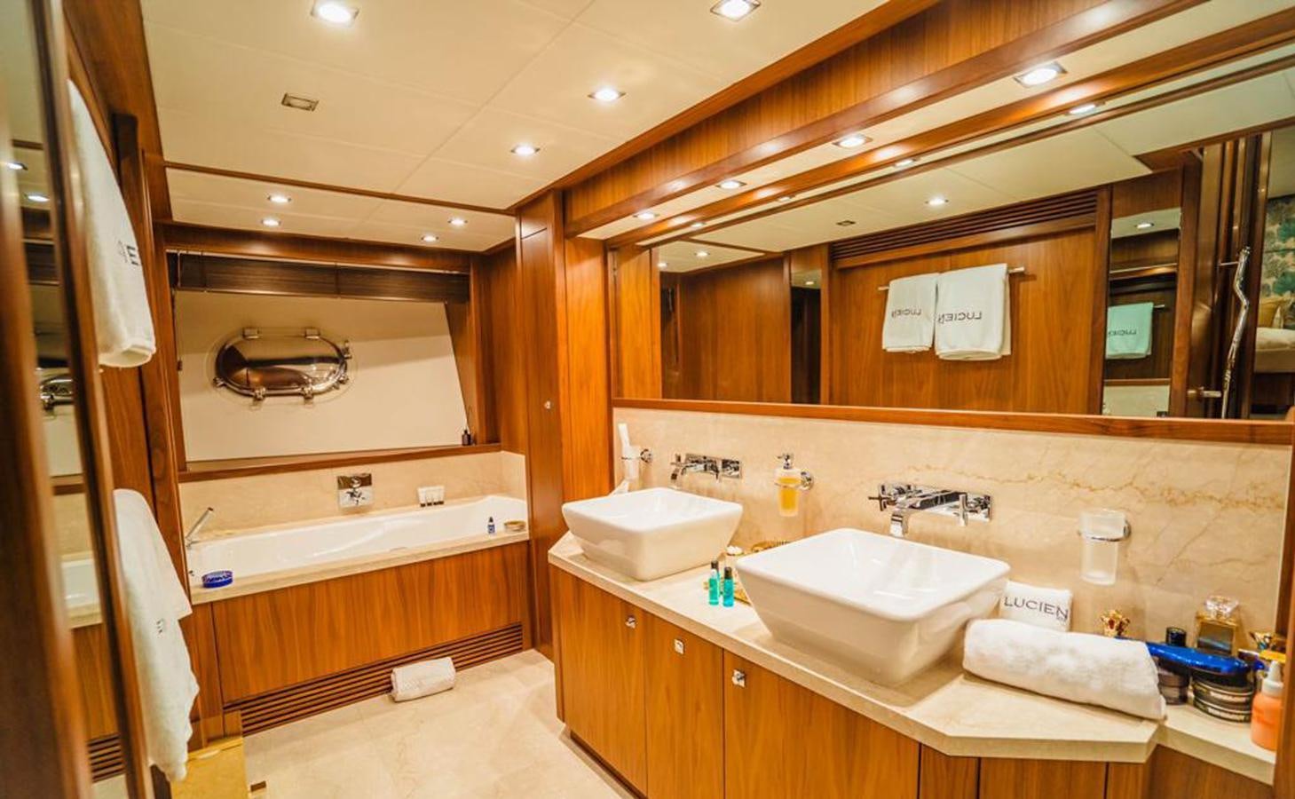a bathroom with a sink and a mirror aboard 2010 SUNSEEKER 40M Yacht for Sale