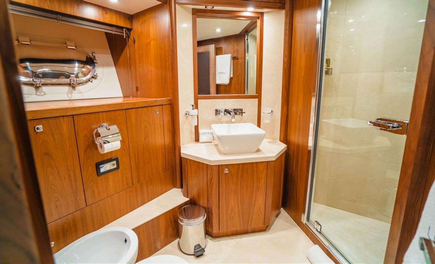 a bathroom with a sink and a shower aboard 2010 SUNSEEKER 40M Yacht for Sale