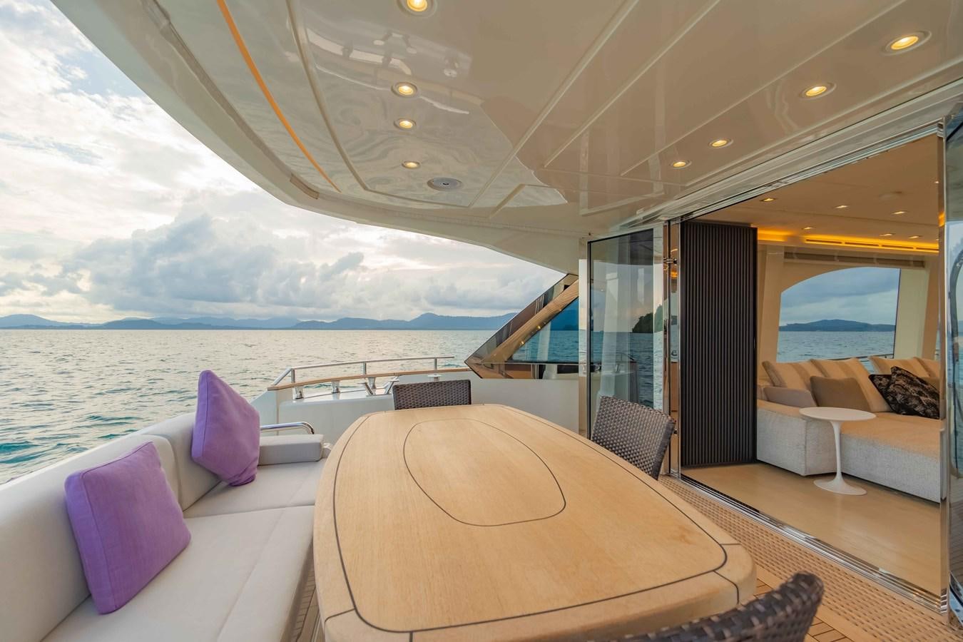 a boat with a large bed aboard ILLUZION Yacht for Sale