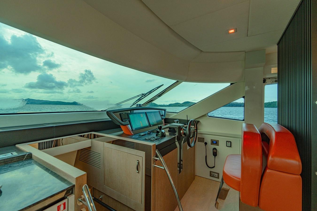 a plane with a view of the ocean aboard ILLUZION Yacht for Sale