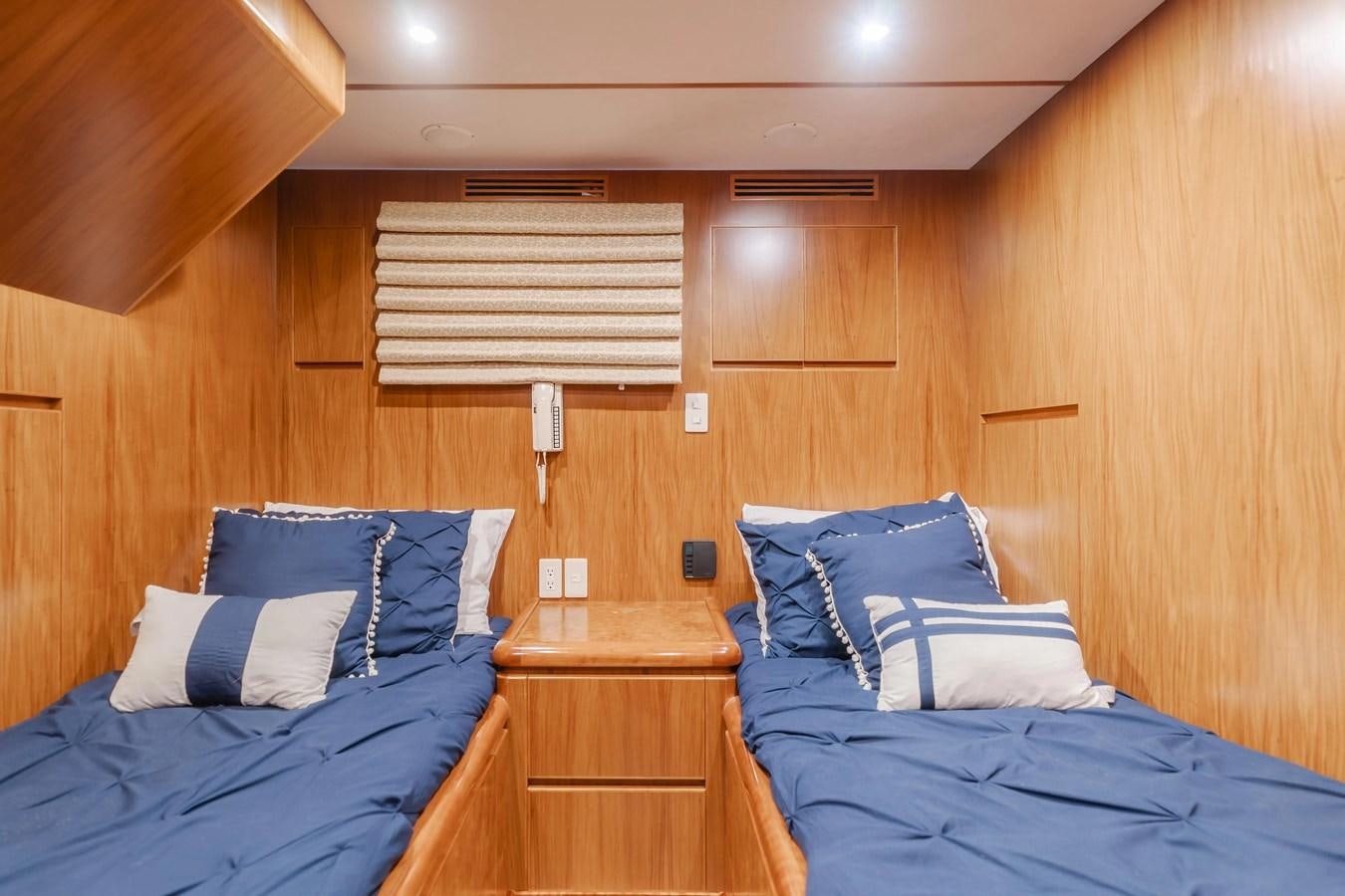 a couple of beds in a cabin aboard MONEY CAT Yacht for Sale