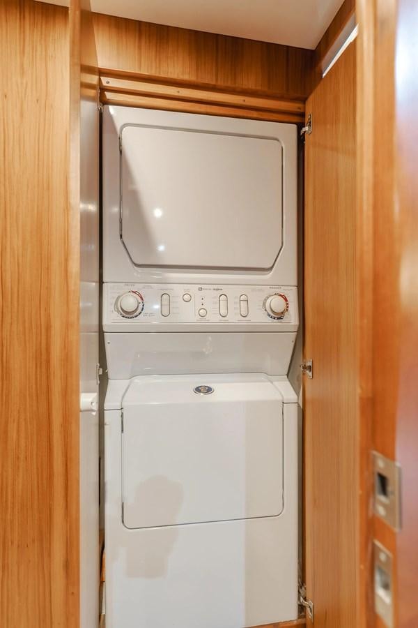 a white appliance in a room aboard MONEY CAT Yacht for Sale