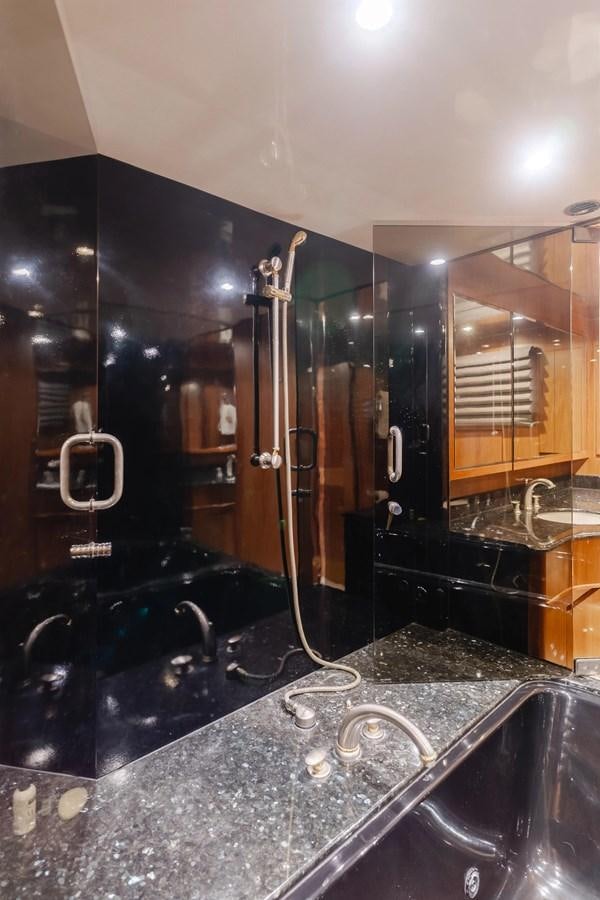 a large metal machine aboard MONEY CAT Yacht for Sale