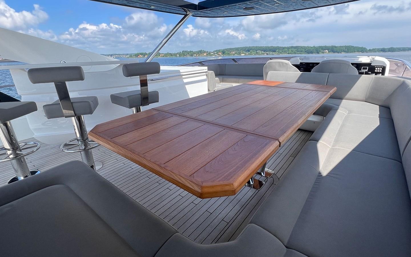 a wooden boat on a deck aboard SALIVITI Yacht for Sale
