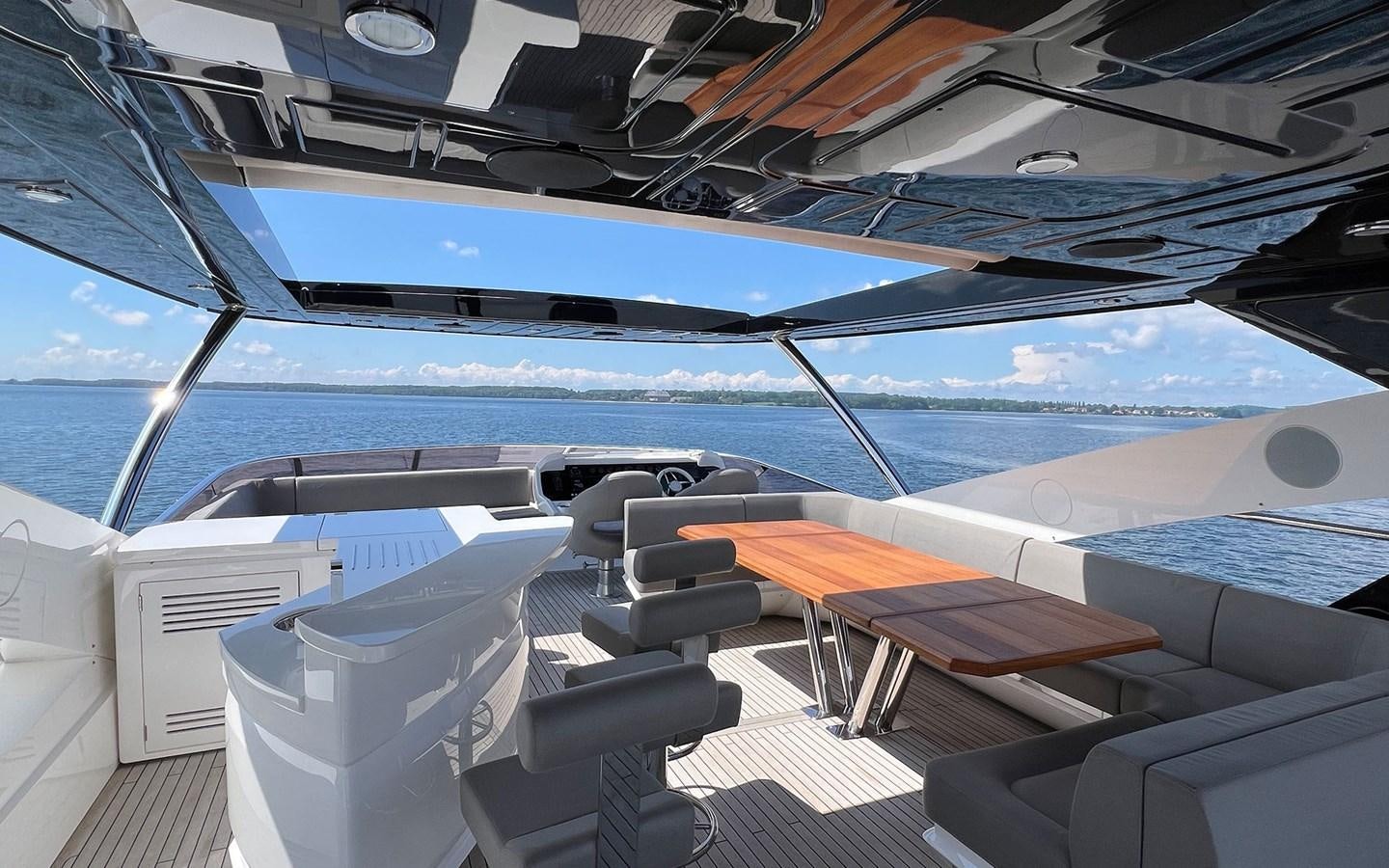 a boat with a deck and chairs aboard SALIVITI Yacht for Sale