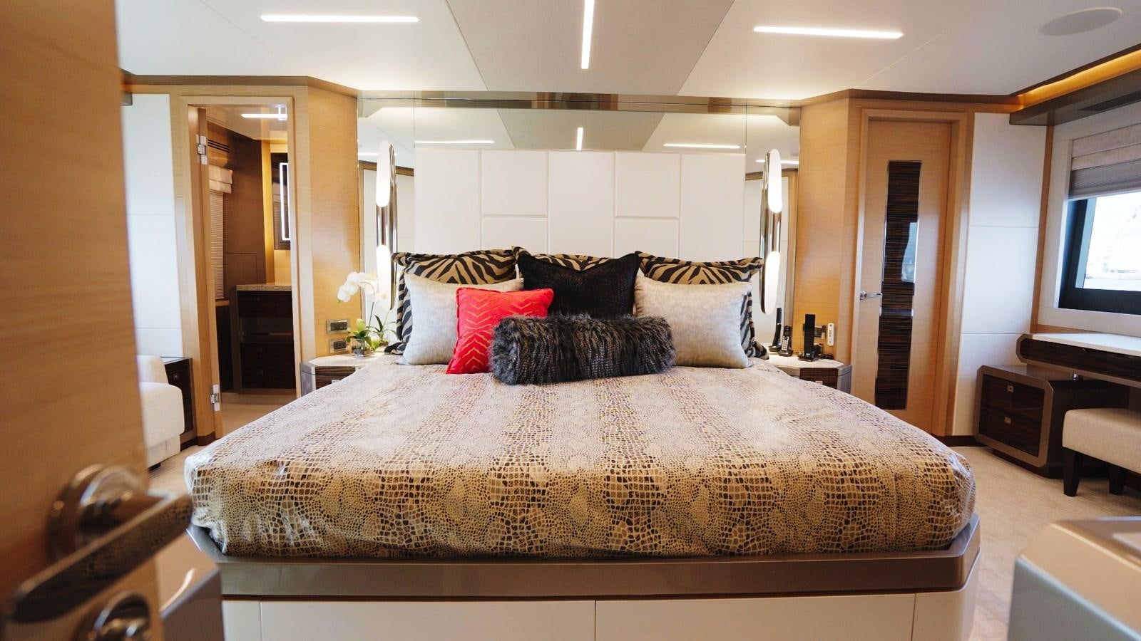 a large bed in a hotel room aboard PANACEA Yacht for Sale