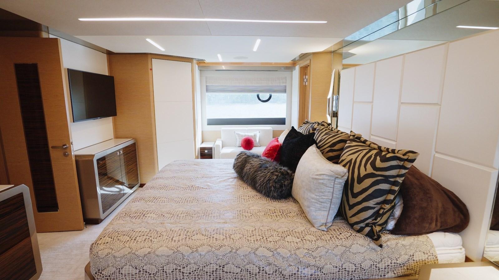 a large bed in a room aboard PANACEA Yacht for Sale
