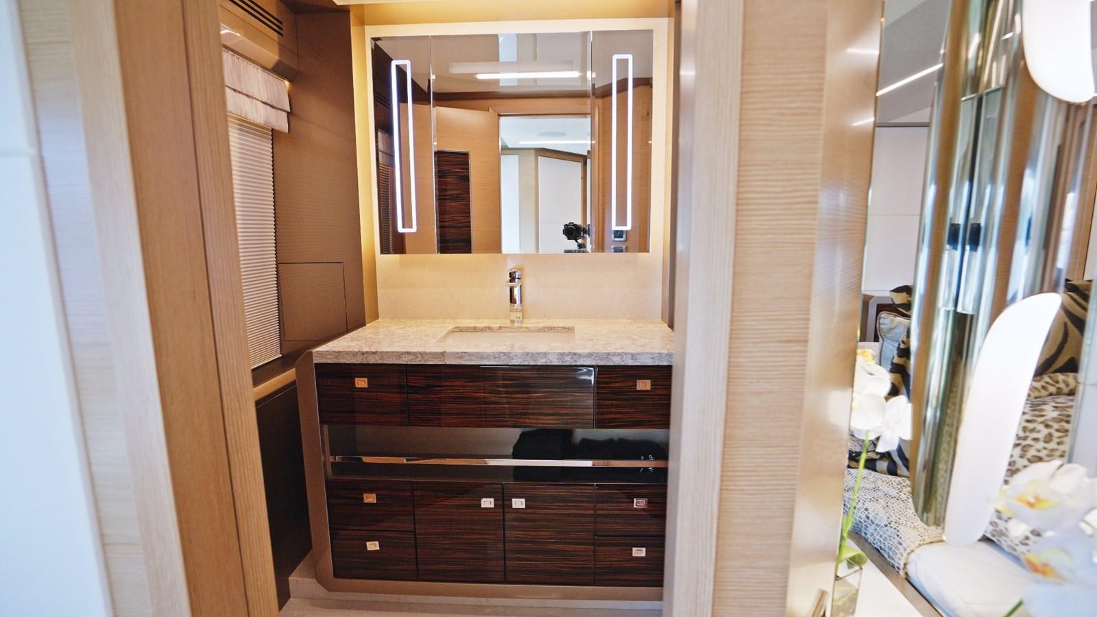 a bathroom with a sink and a mirror aboard PANACEA Yacht for Sale