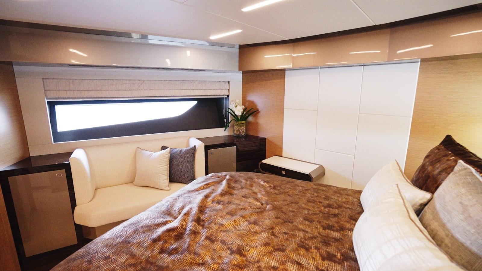 a hotel room with a bed and a tv aboard PANACEA Yacht for Sale