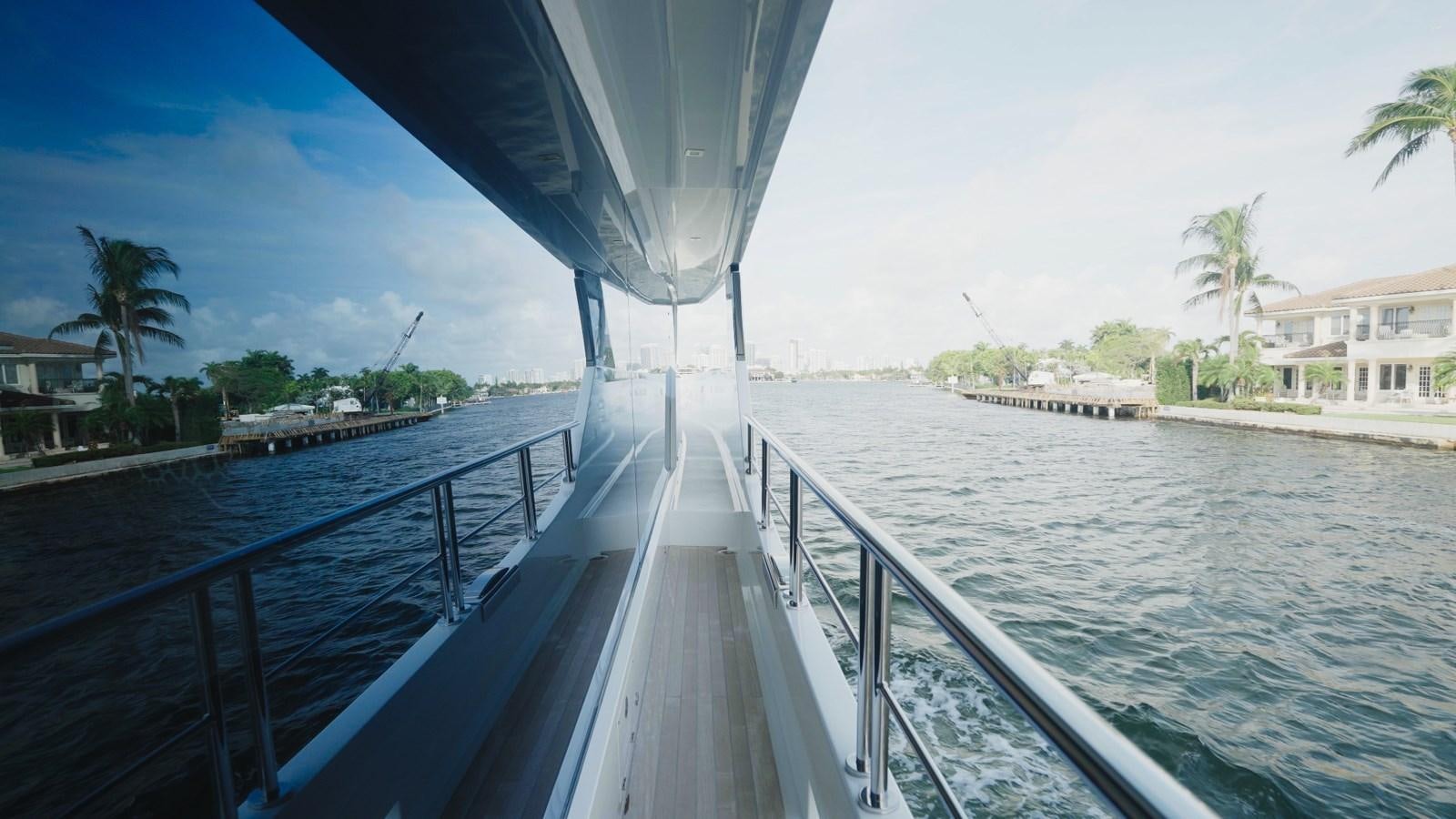 a long dock leading to a beach aboard PANACEA Yacht for Sale