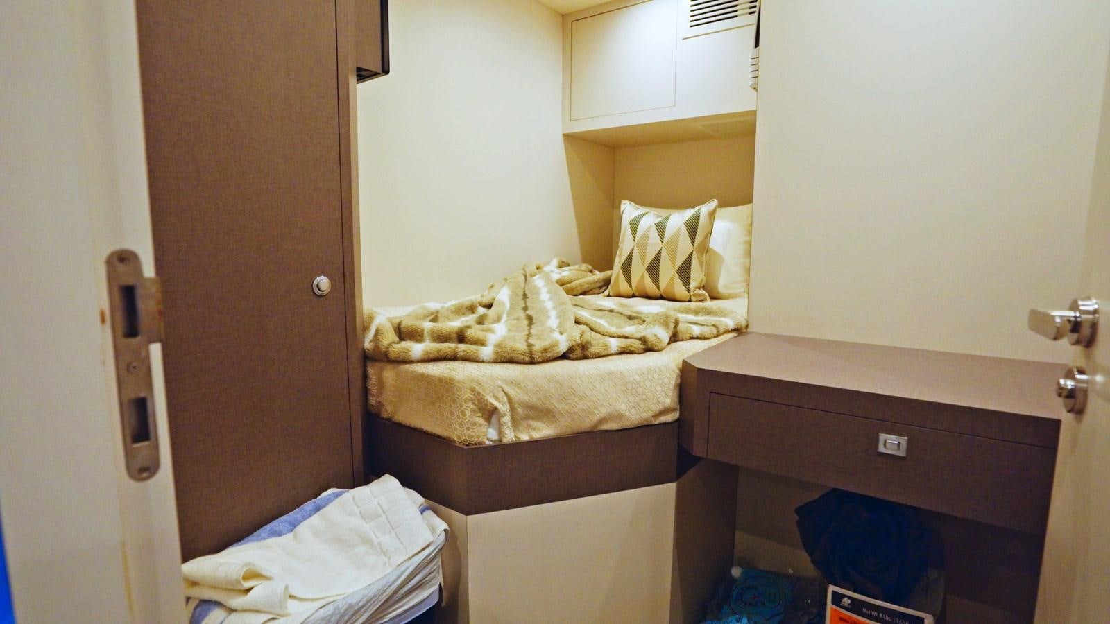 a bed in a room aboard PANACEA Yacht for Sale