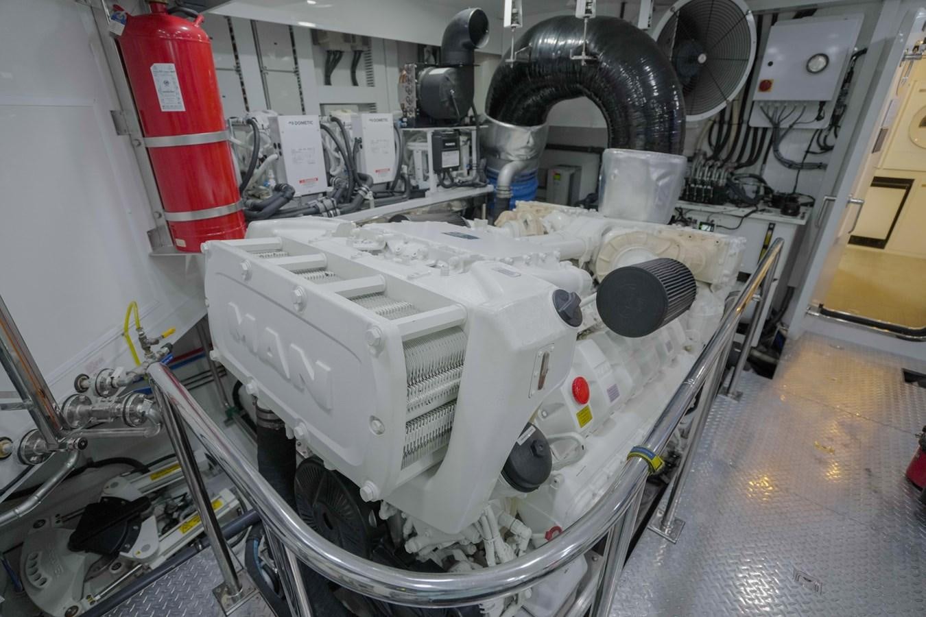 a white machine with black wheels aboard PANACEA Yacht for Sale