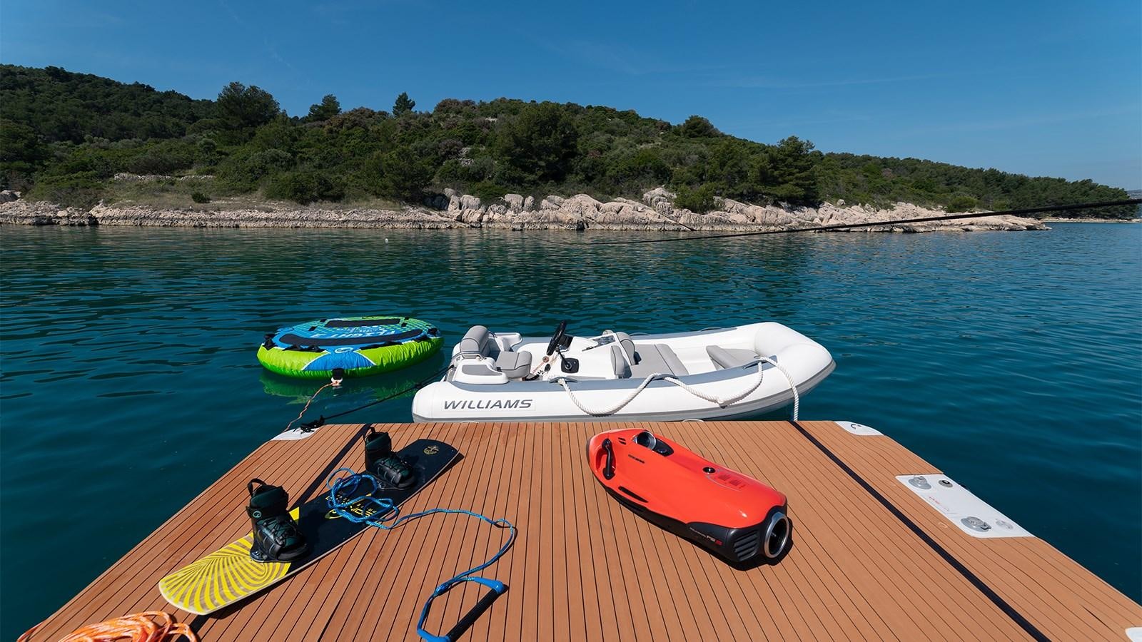 boats on a dock aboard CARDANO Yacht for Sale