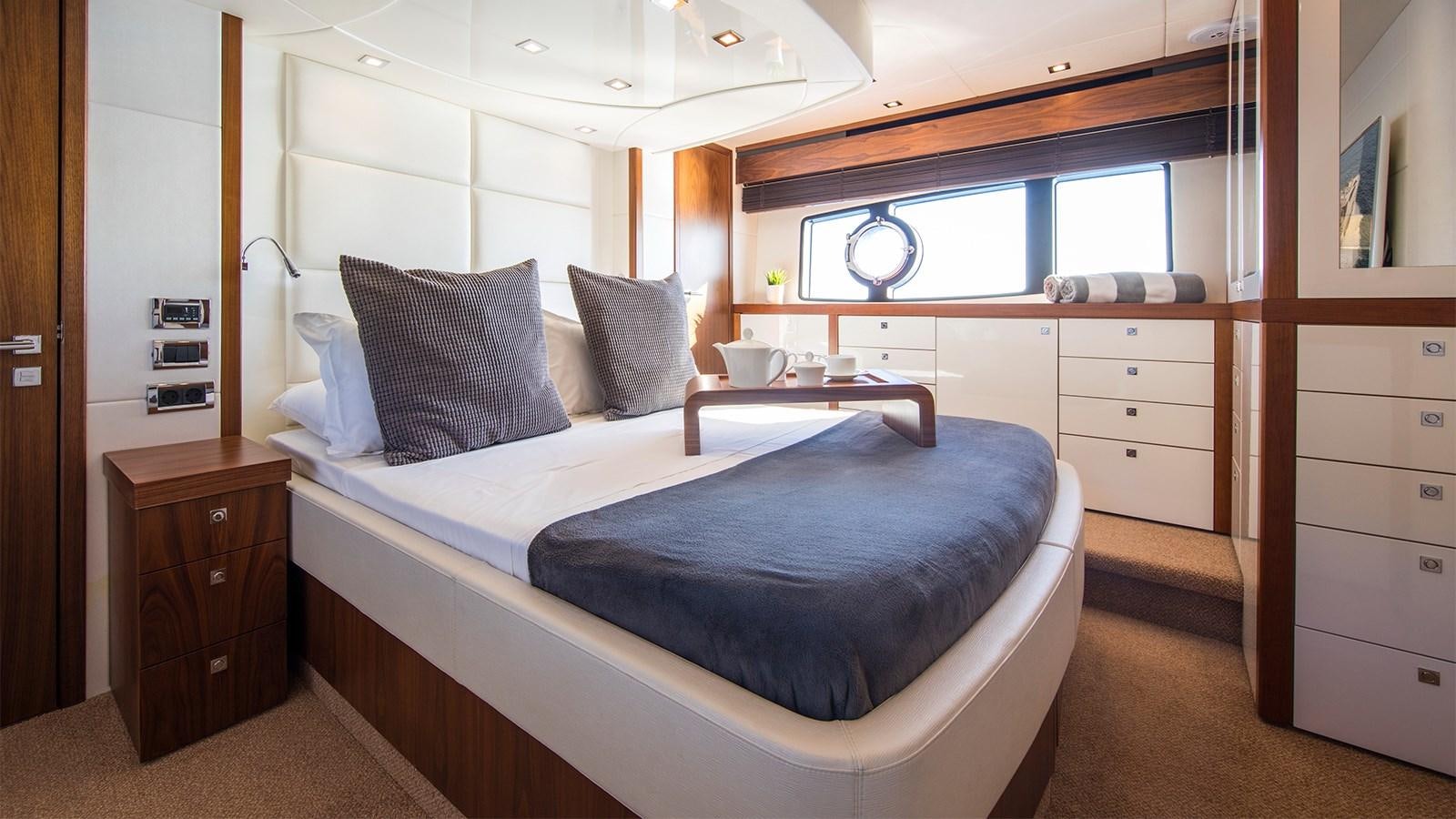 a bed in a room aboard CARDANO Yacht for Sale
