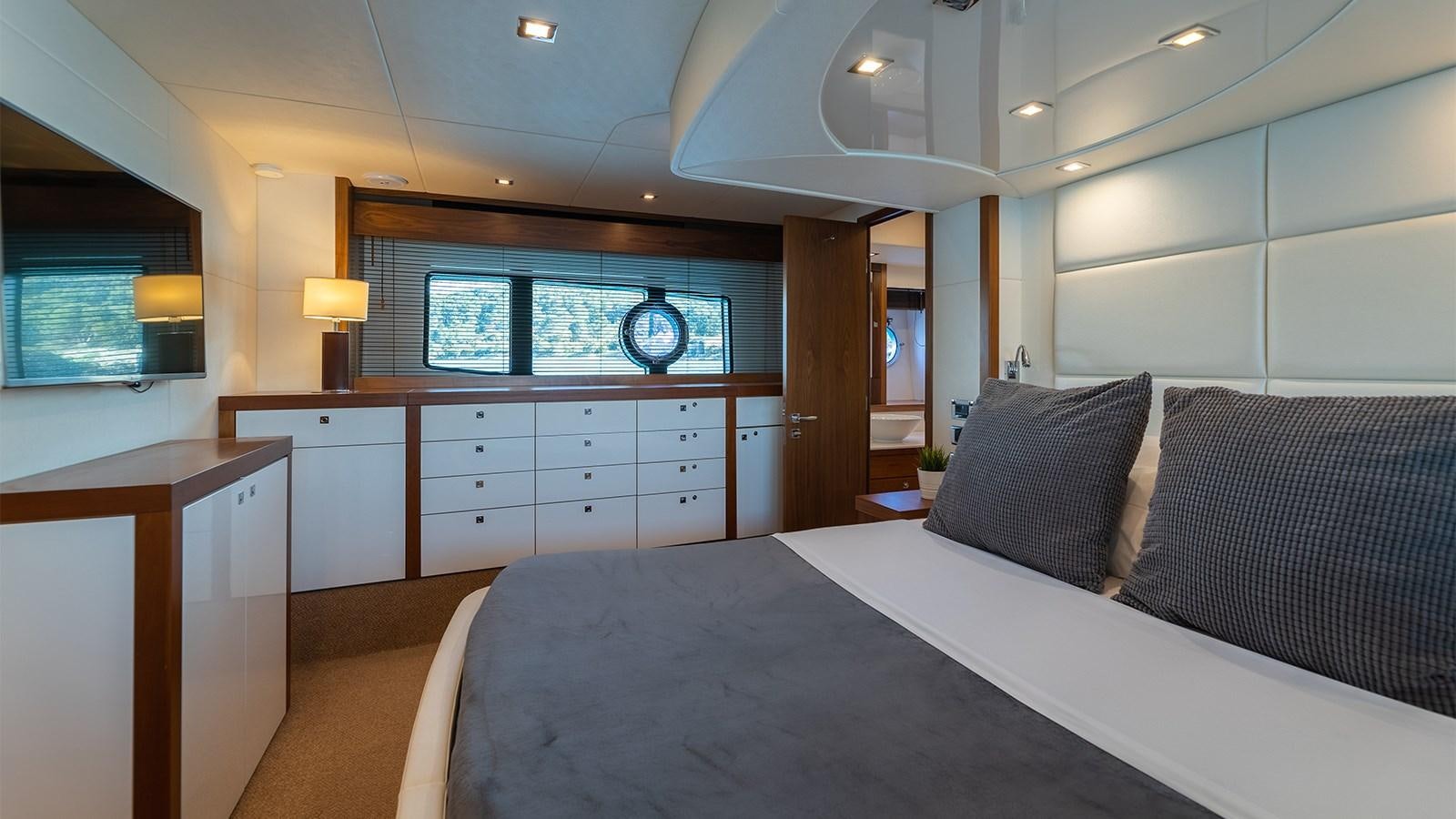 a bed in a room aboard CARDANO Yacht for Sale