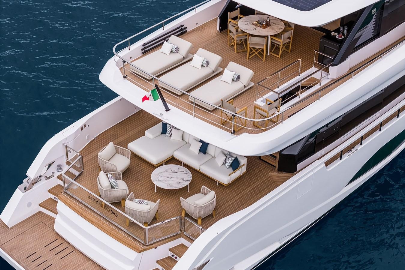 a large white boat on a body of water aboard FERRETTI  INFYNITO 90 Yacht for Sale