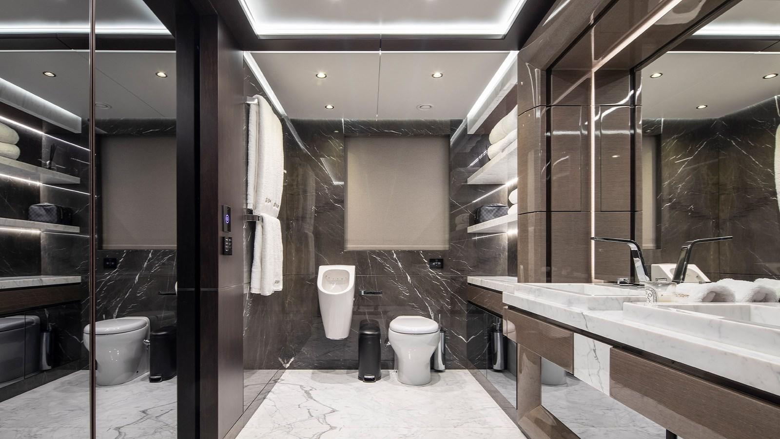 a bathroom with a toilet and sink aboard GISA Yacht for Sale
