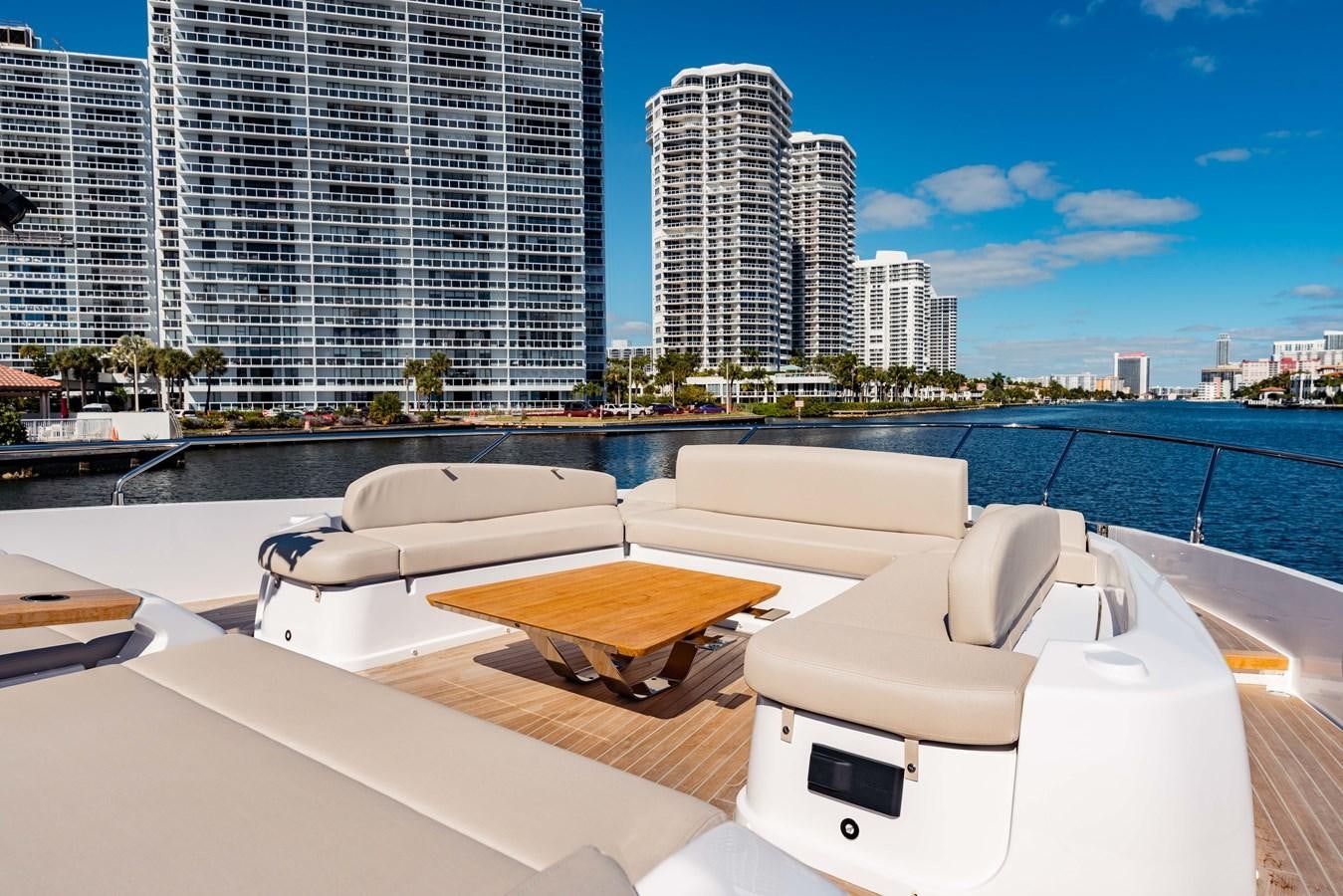 a room with a view of a city and a body of water aboard VITTORIA Yacht for Sale