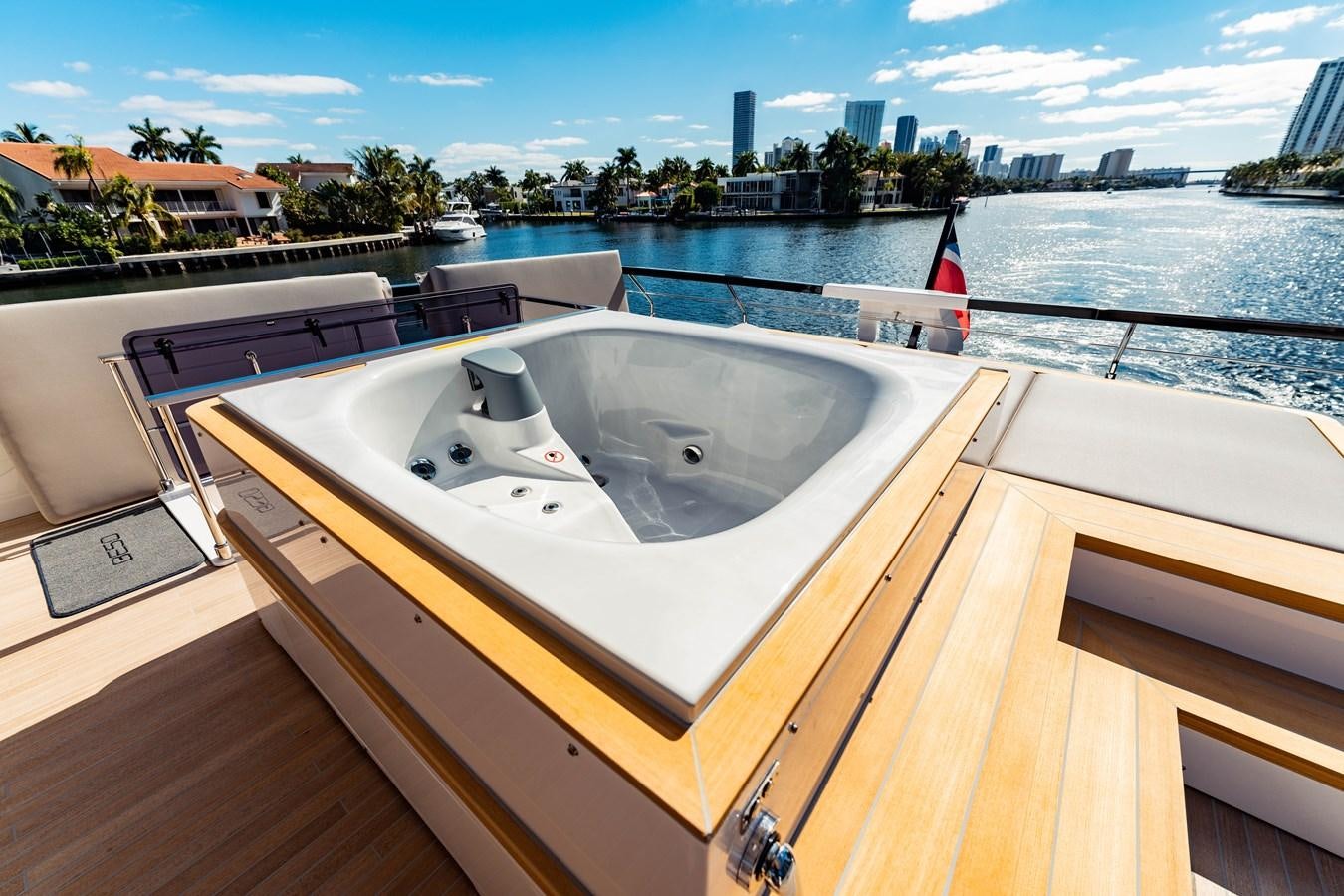 a large white bathtub with a sink on it aboard VITTORIA Yacht for Sale