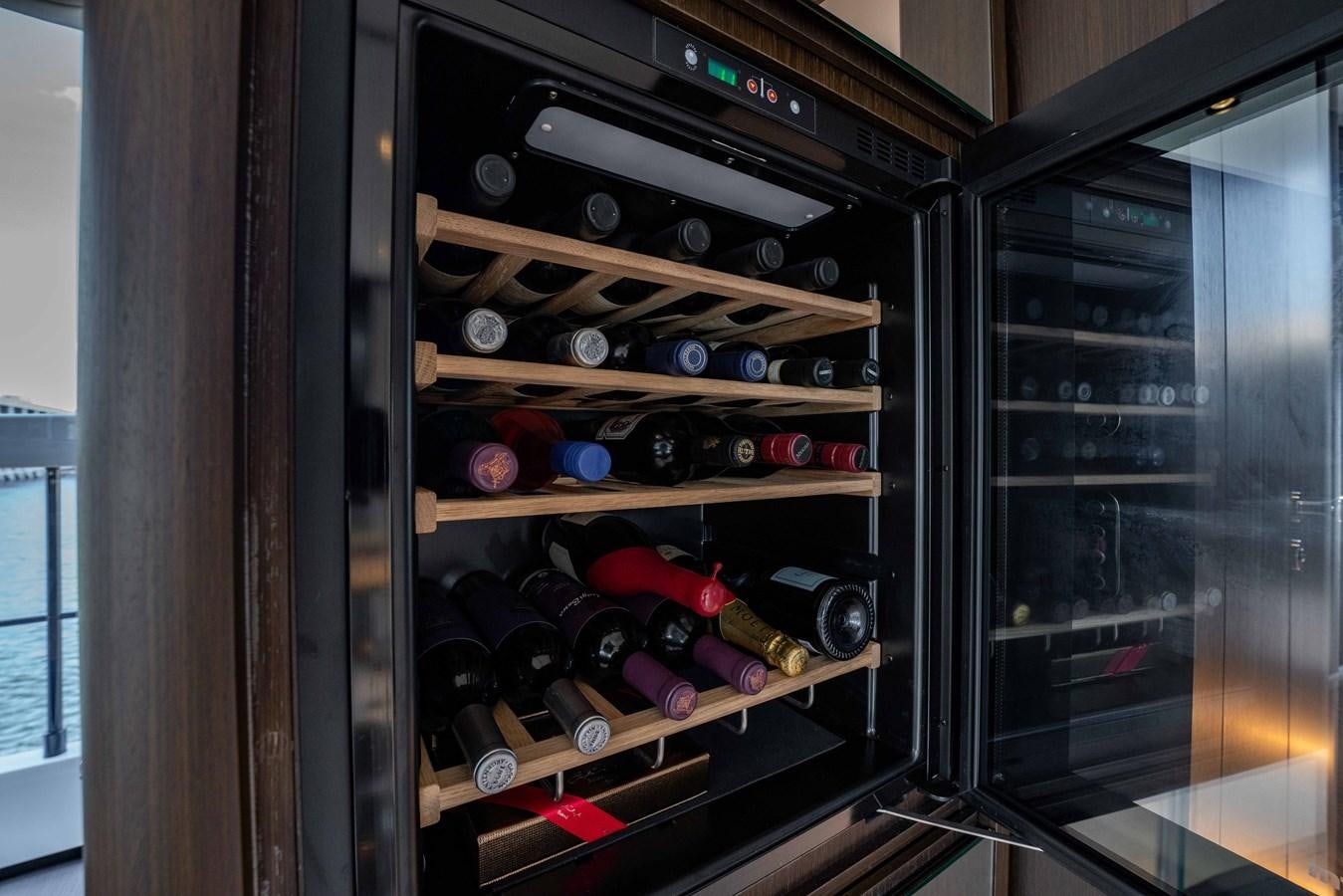 a machine with many bottles of wine aboard VITTORIA Yacht for Sale