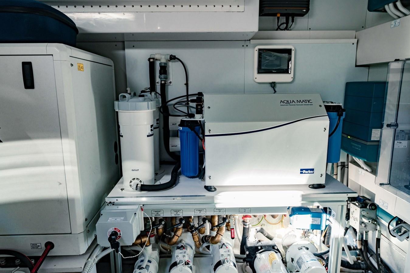 a machine with a monitor and other objects on it aboard VITTORIA Yacht for Sale