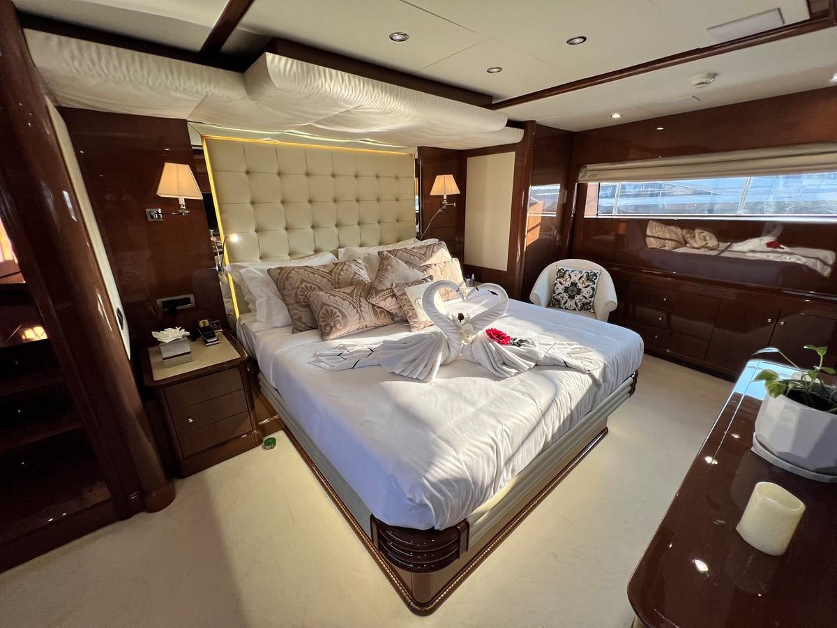 a bed in a hotel room aboard 2009 BENETTI 85 LEGEND Yacht for Sale