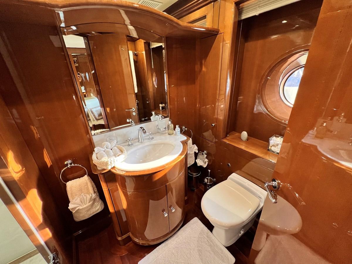 a bathroom with a large mirror aboard 2009 BENETTI 85 LEGEND Yacht for Sale